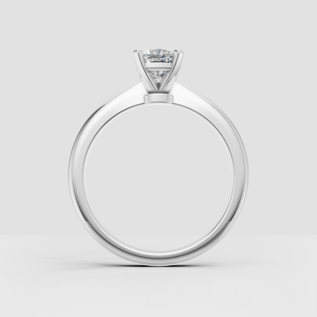 Cushion Diamond solitaire ring with tapered gold shoulders