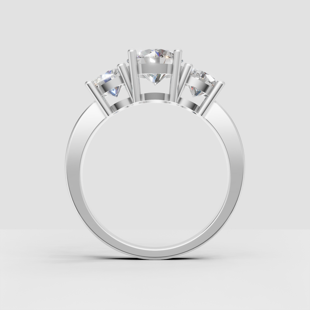Elegant yellow gold three-stone diamond engagement ring