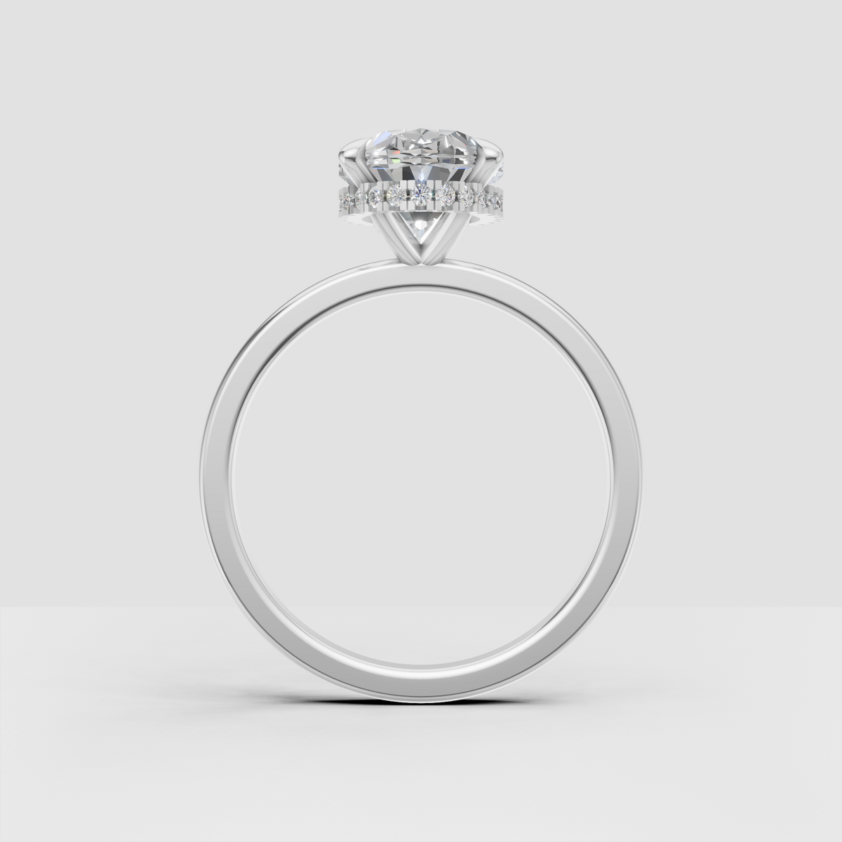 Oval engagement ring with round accent diamonds