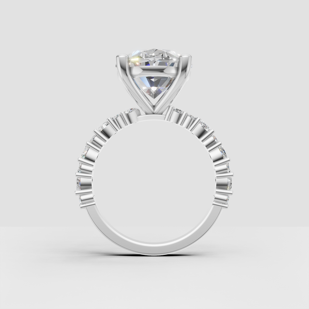 Oval diamond ring featuring a detailed split accent band