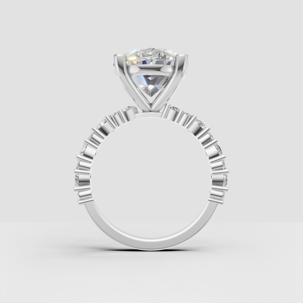 Oval diamond ring featuring a detailed split accent band
