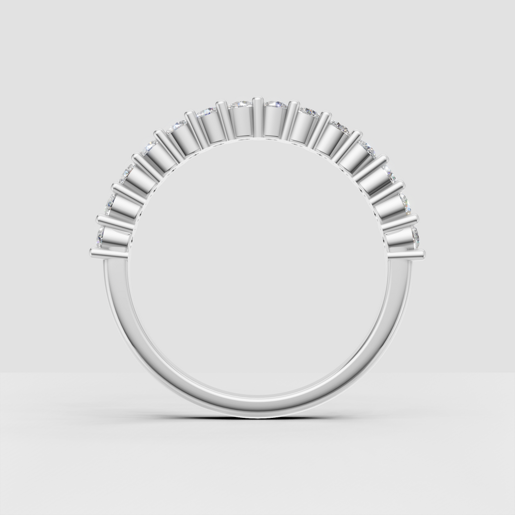 Prong-set round diamond eternity ring with smooth polished shank