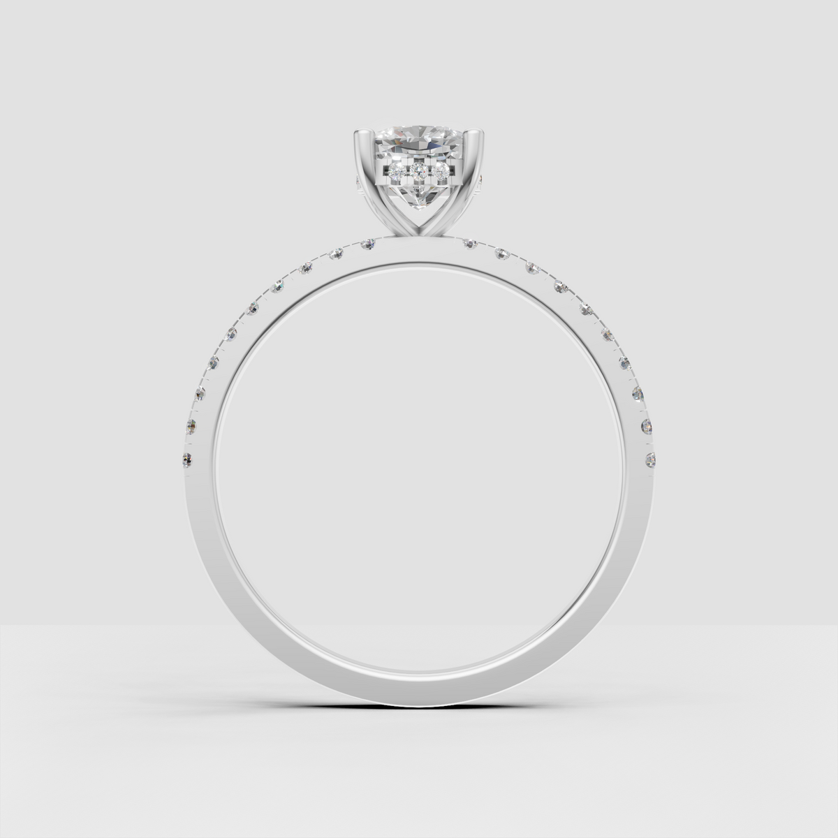 Cushion diamond engagement ring with hidden halo viewed from side