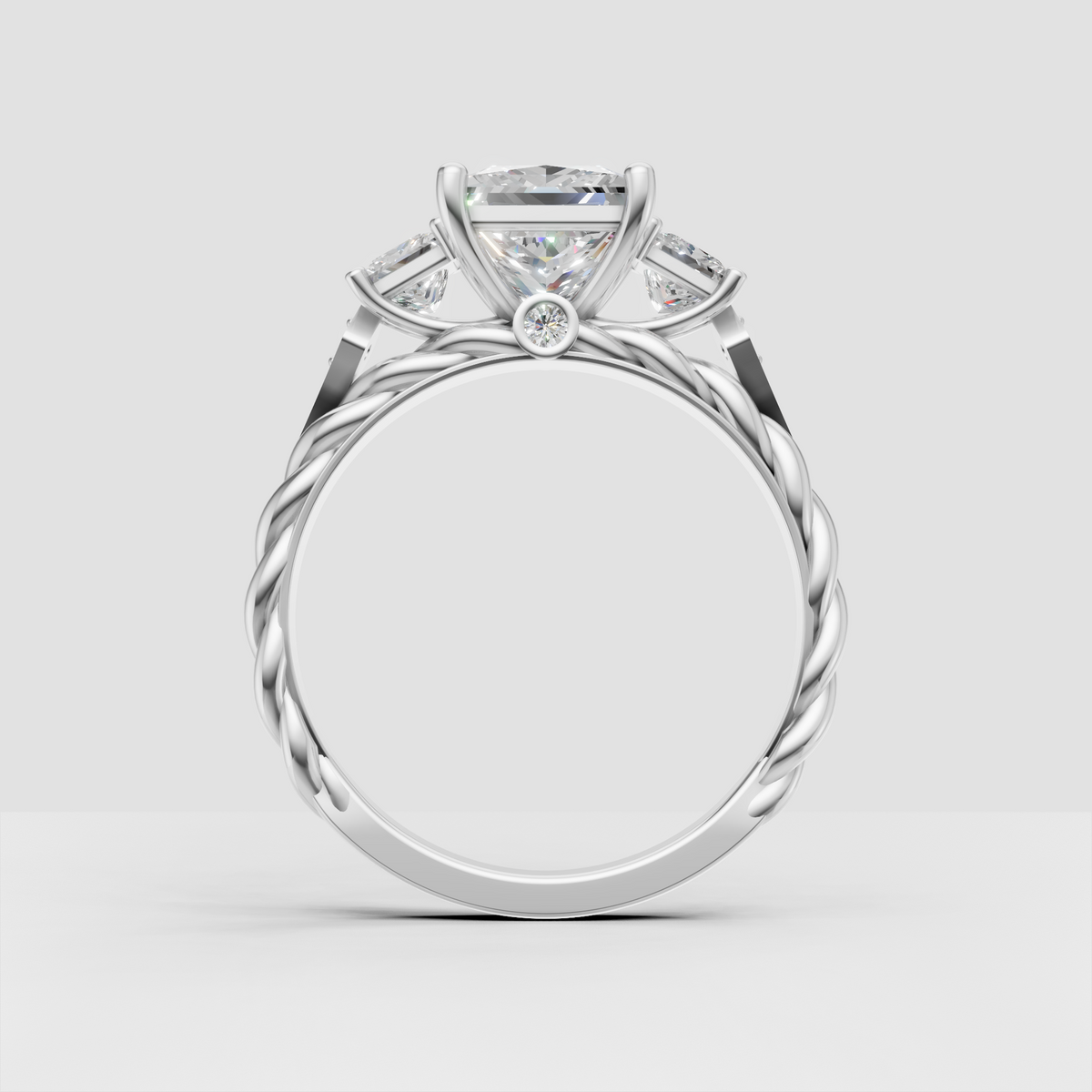 Princess cut diamond ring with matching side stones and ornate band