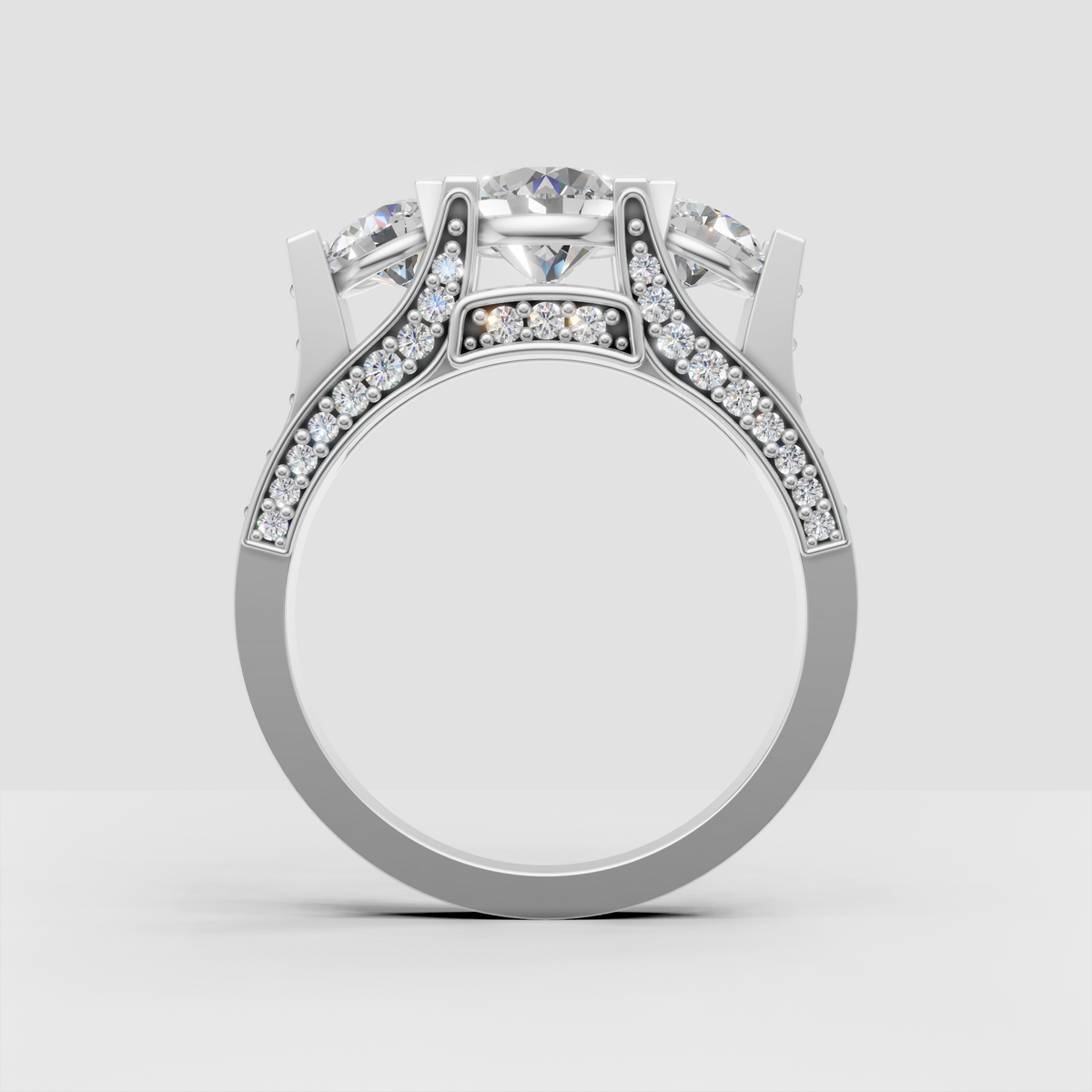 Three stone engagement ring with brilliant round diamonds