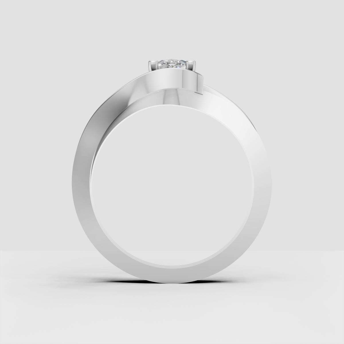Elegant modern bypass engagement ring with oval center stone and pave band