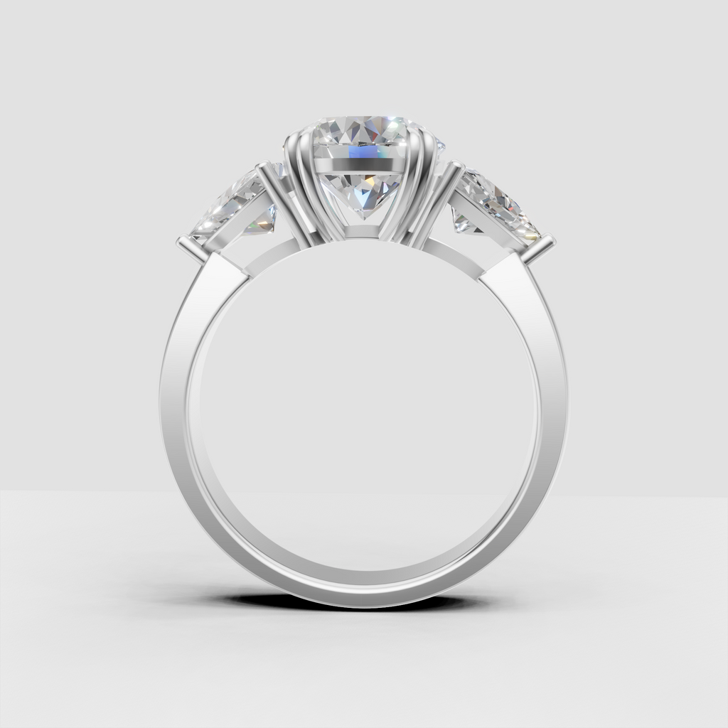 Classic three-stone diamond ring with round and Trillion cut stones