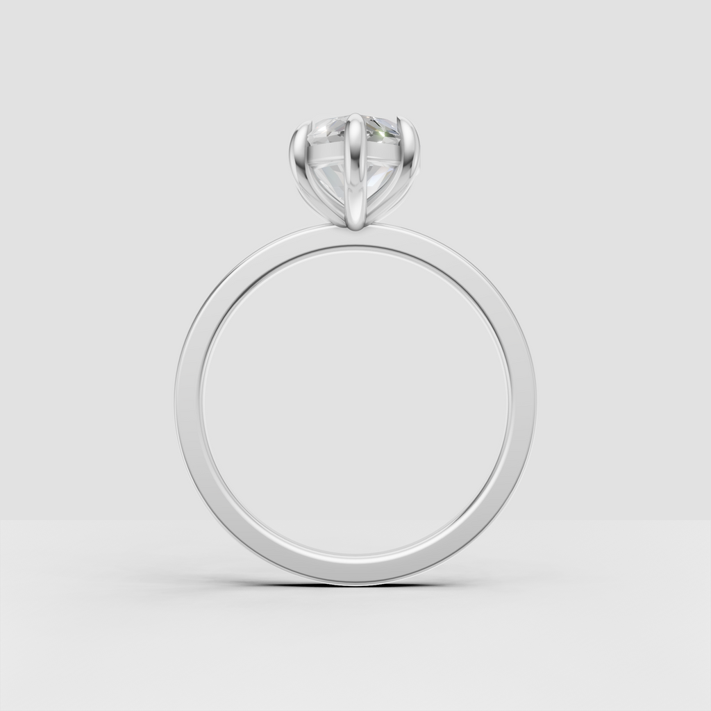 Polished yellow gold solitaire ring with marquise center stone