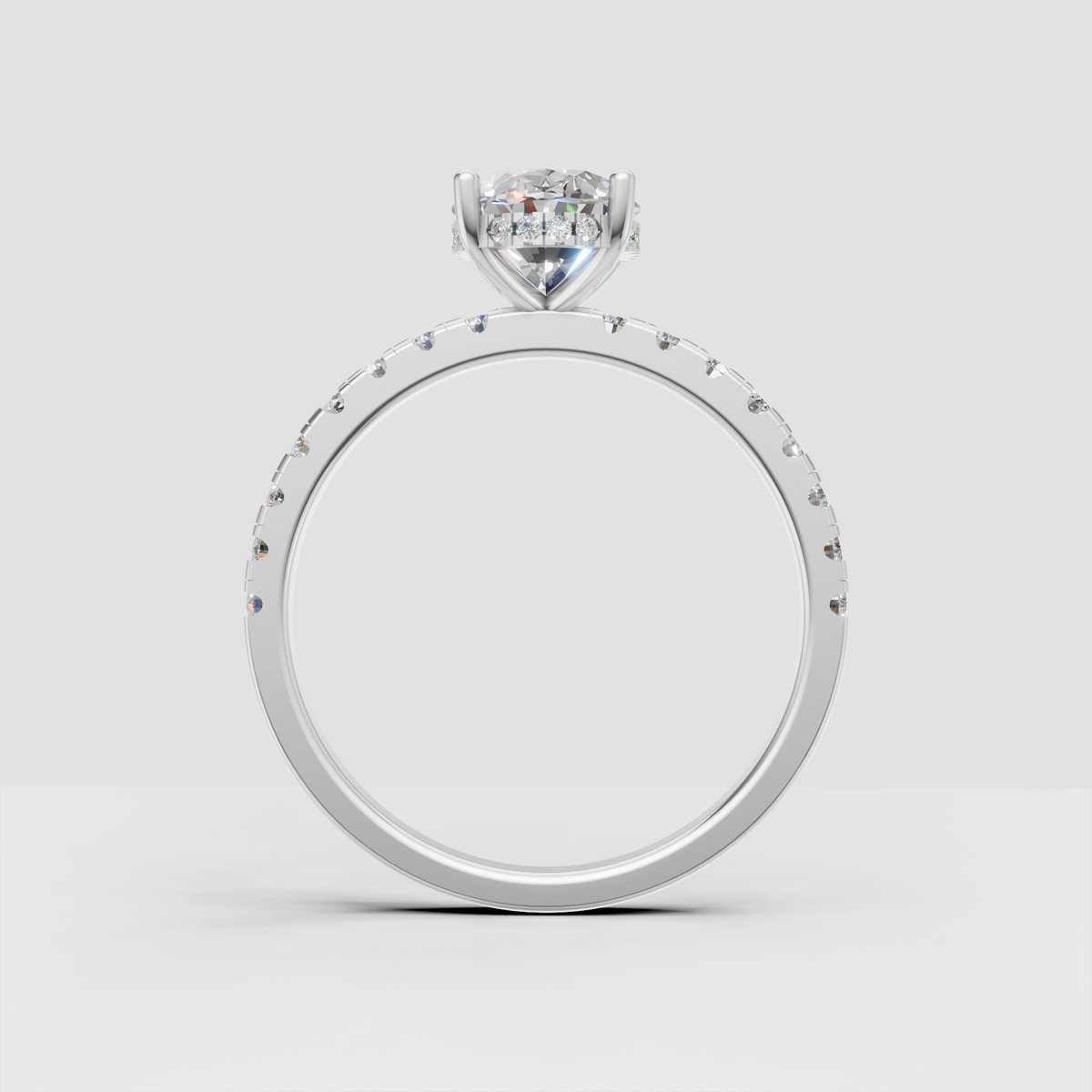 Oval center diamond with concealed halo bridal ring