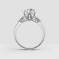 Elegant three-stone engagement ring with round center stone