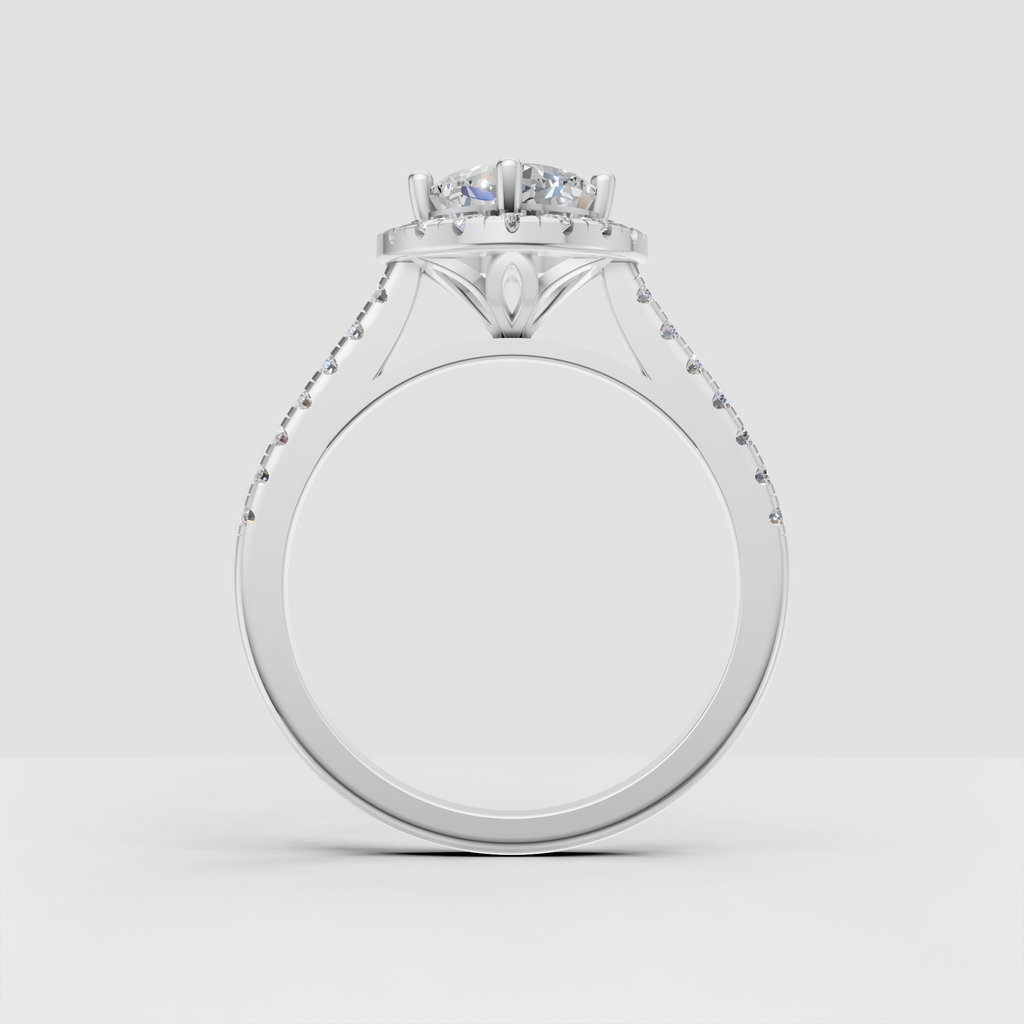 Cushion cut engagement ring with cathedral profile and sparkling pavé shoulders