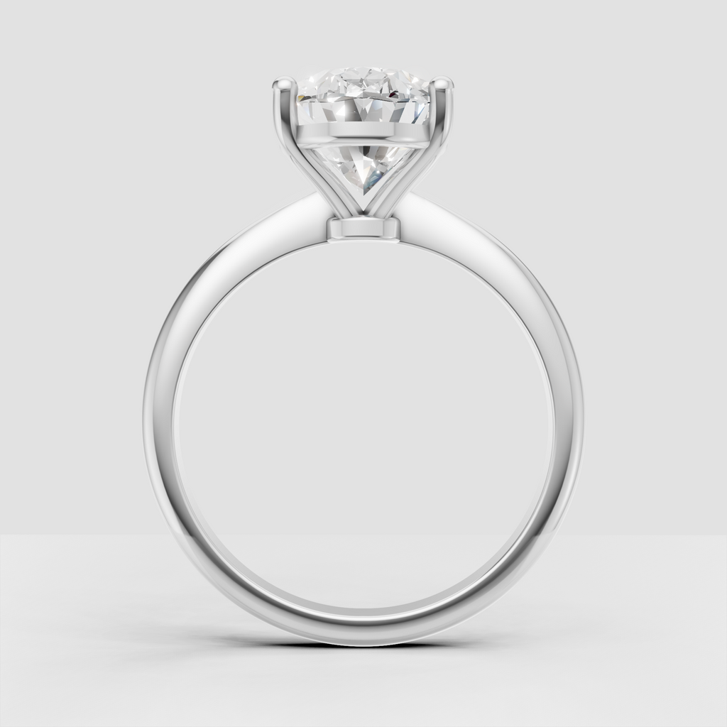 Oval Diamond engagement ring with minimalist solitaire design and four prongs