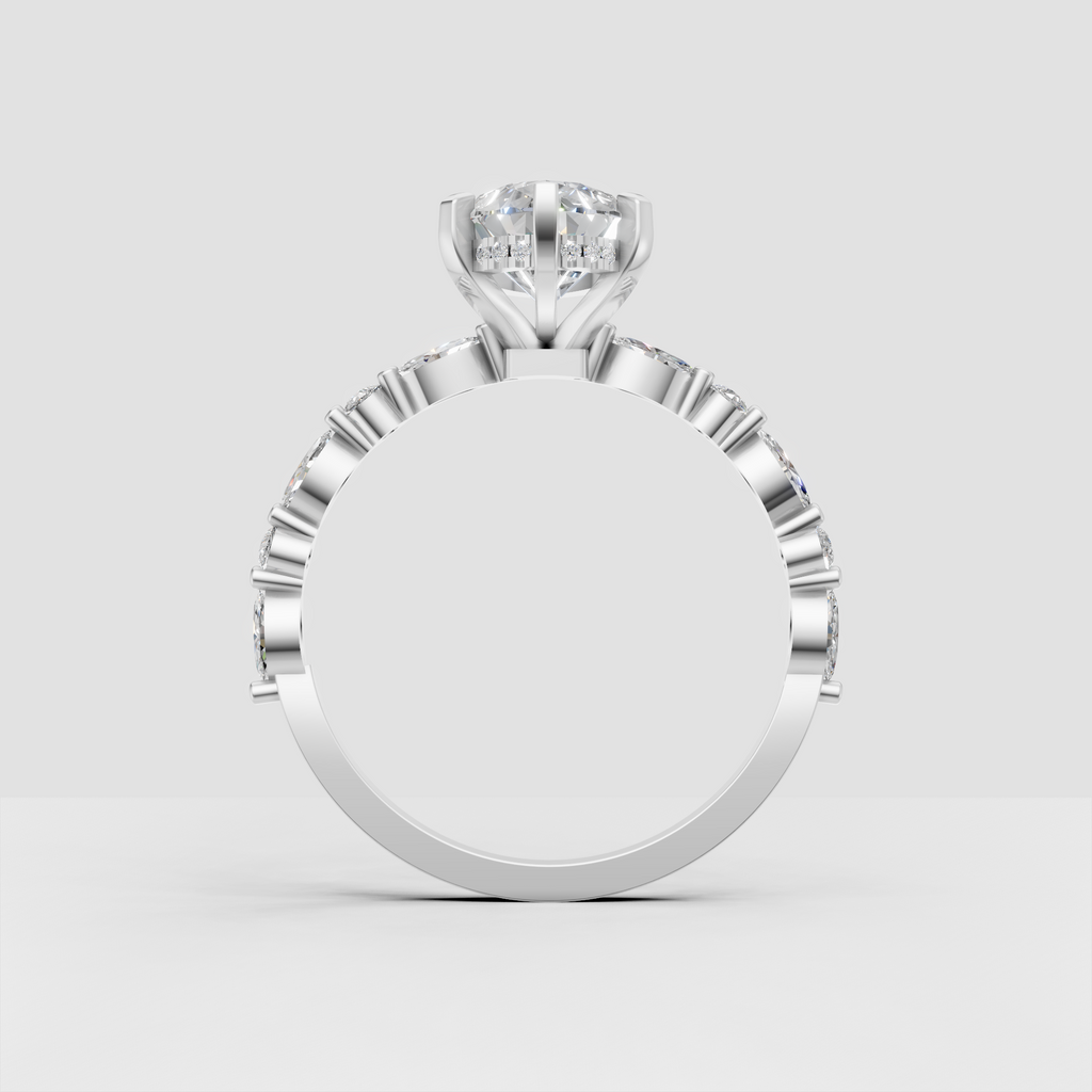 Yellow gold marquise solitaire engagement ring with cathedral setting