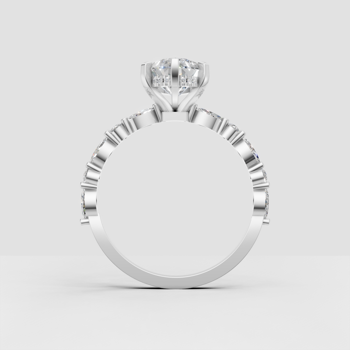 Yellow gold marquise solitaire engagement ring with cathedral setting