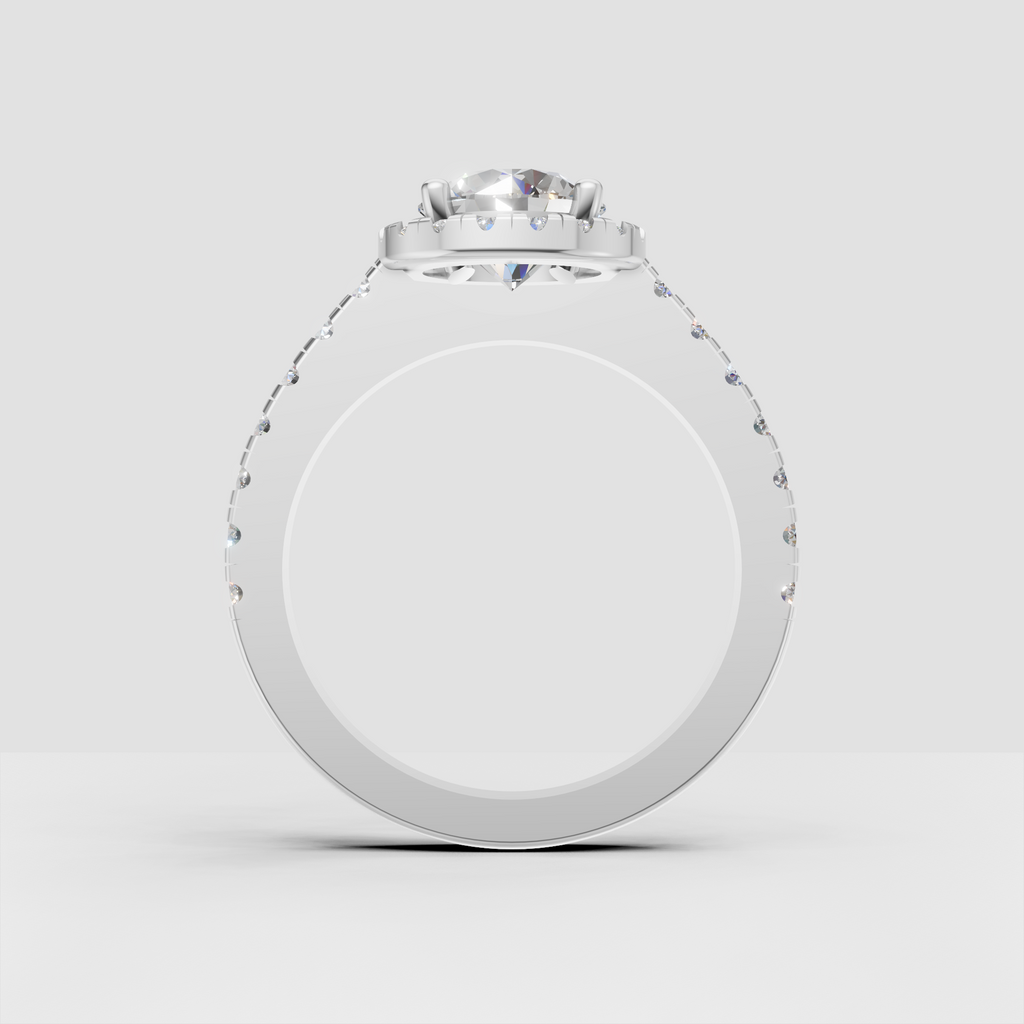 Four-prong halo engagement ring with diamond-lined band