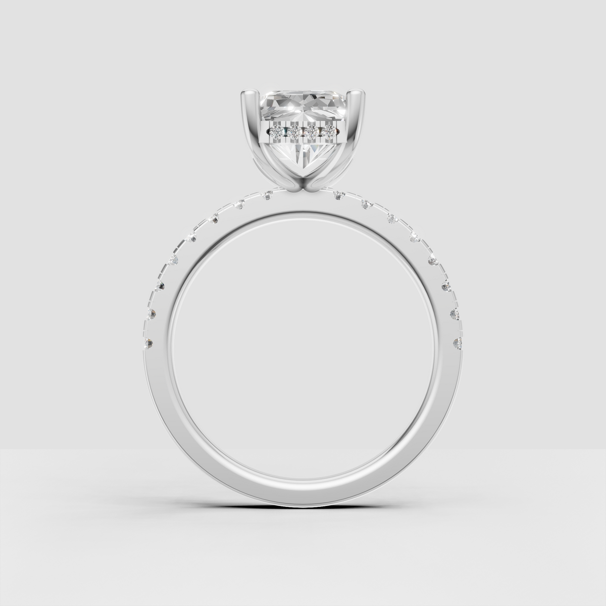 Hidden halo radiant engagement ring with polished rose gold band