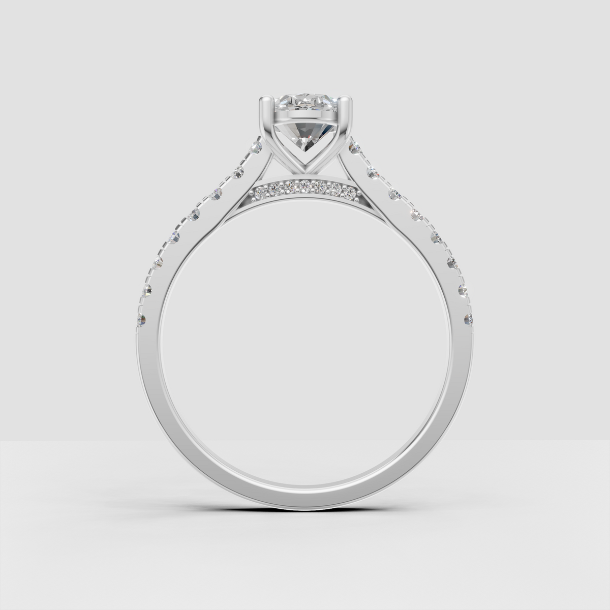Oval cut diamond ring with detailed diamond band
