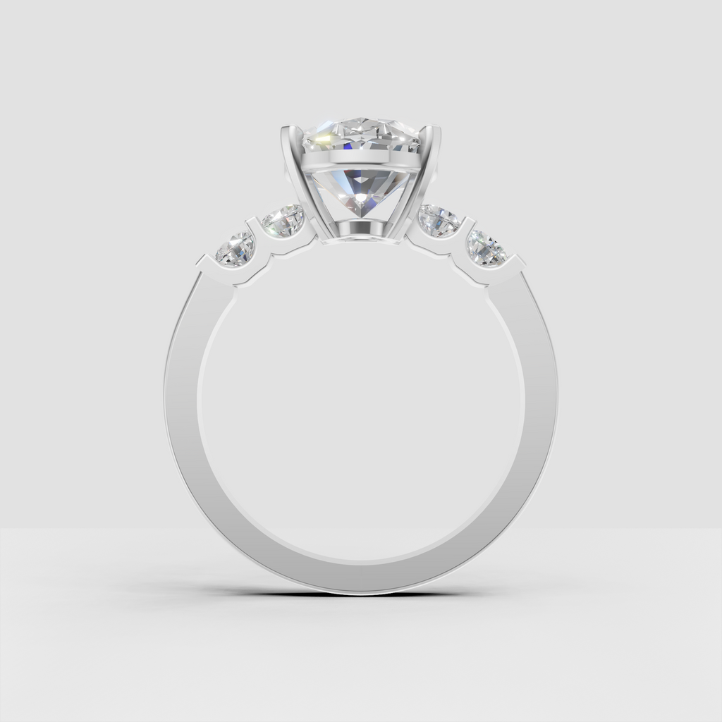 Oval center stone cathedral engagement ring with polished gold shank