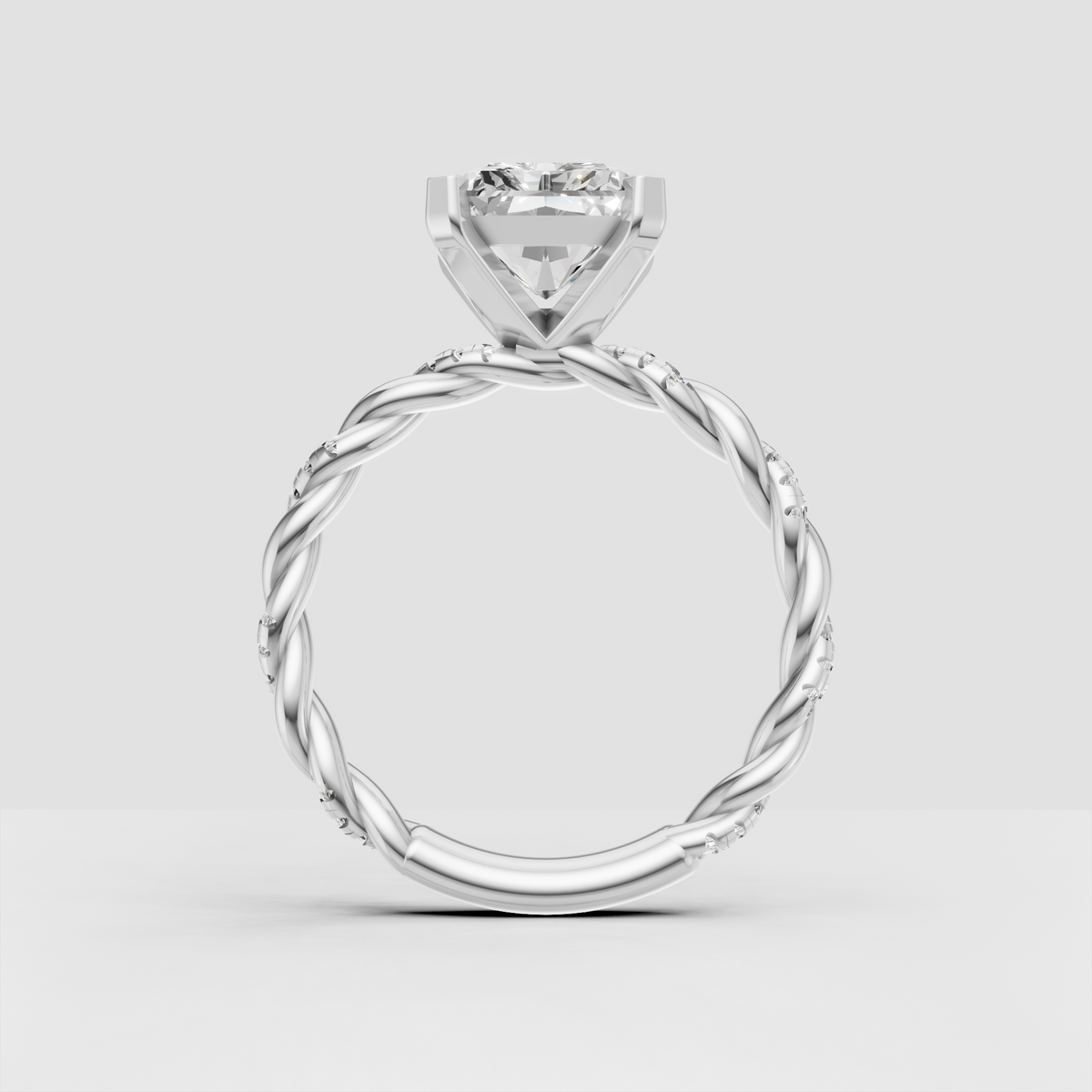 Radiant cut diamond engagement ring with intertwined gold band