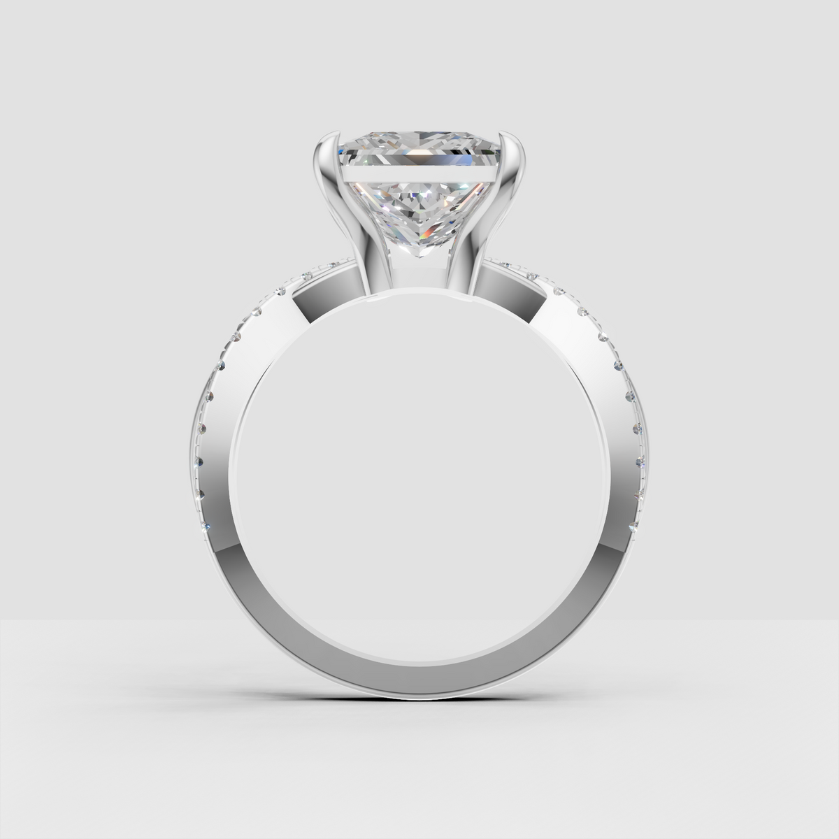 Square diamond engagement ring with pavé accent stones on the shoulders