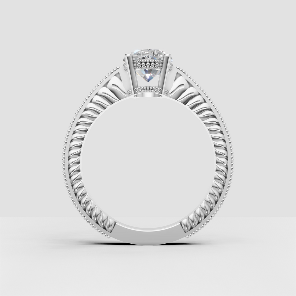 Vintage-inspired oval engagement ring with four-prong diamond setting