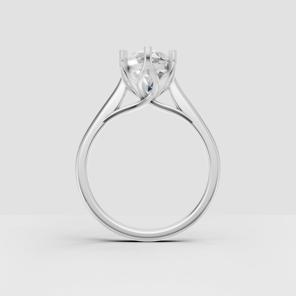 Modern marquise diamond engagement ring with polished metal band