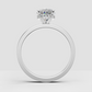 Classic oval diamond engagement ring in polished yellow gold