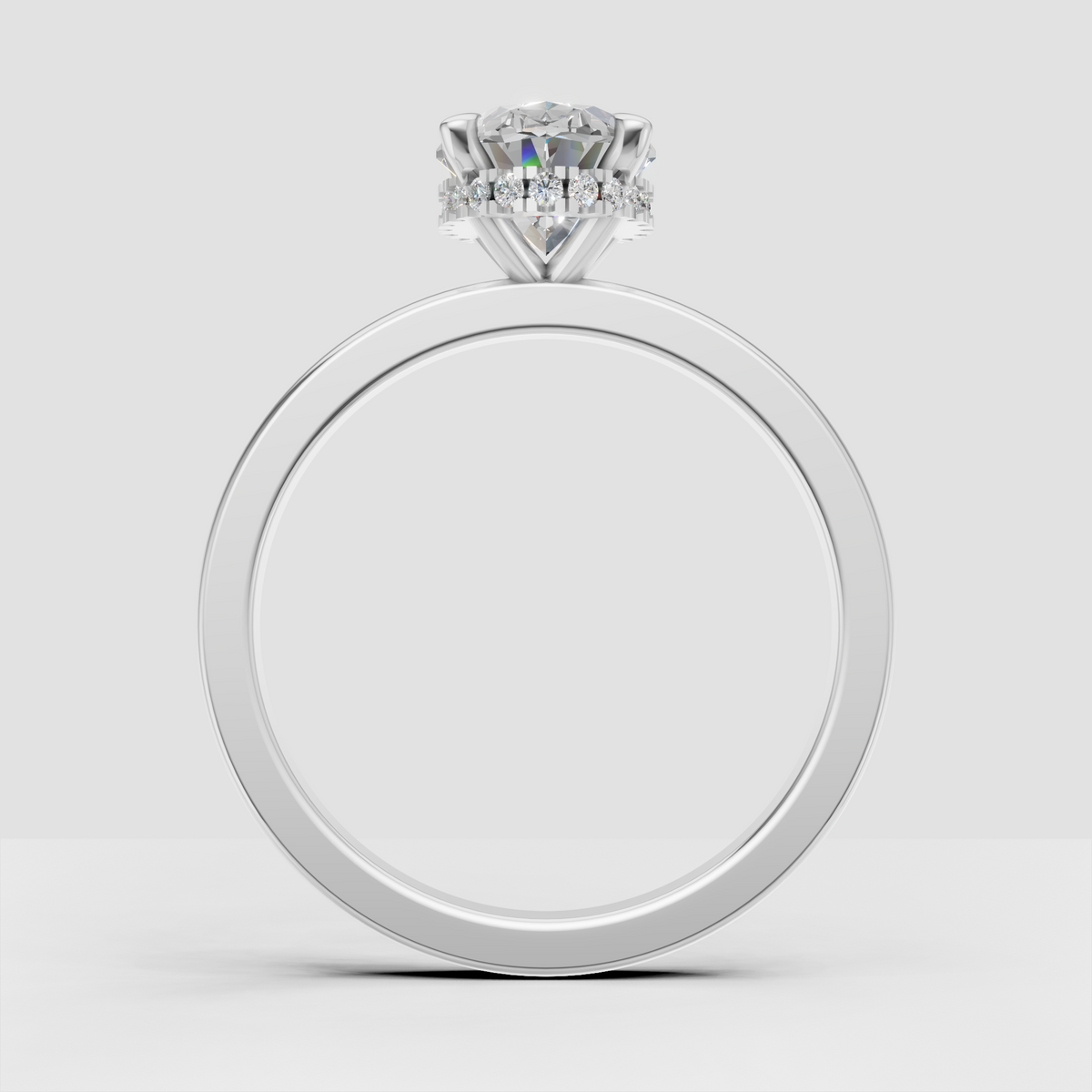Classic oval diamond engagement ring in polished yellow gold