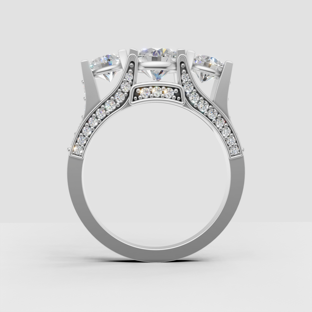 Three round diamond engagement ring with intricate pave gallery