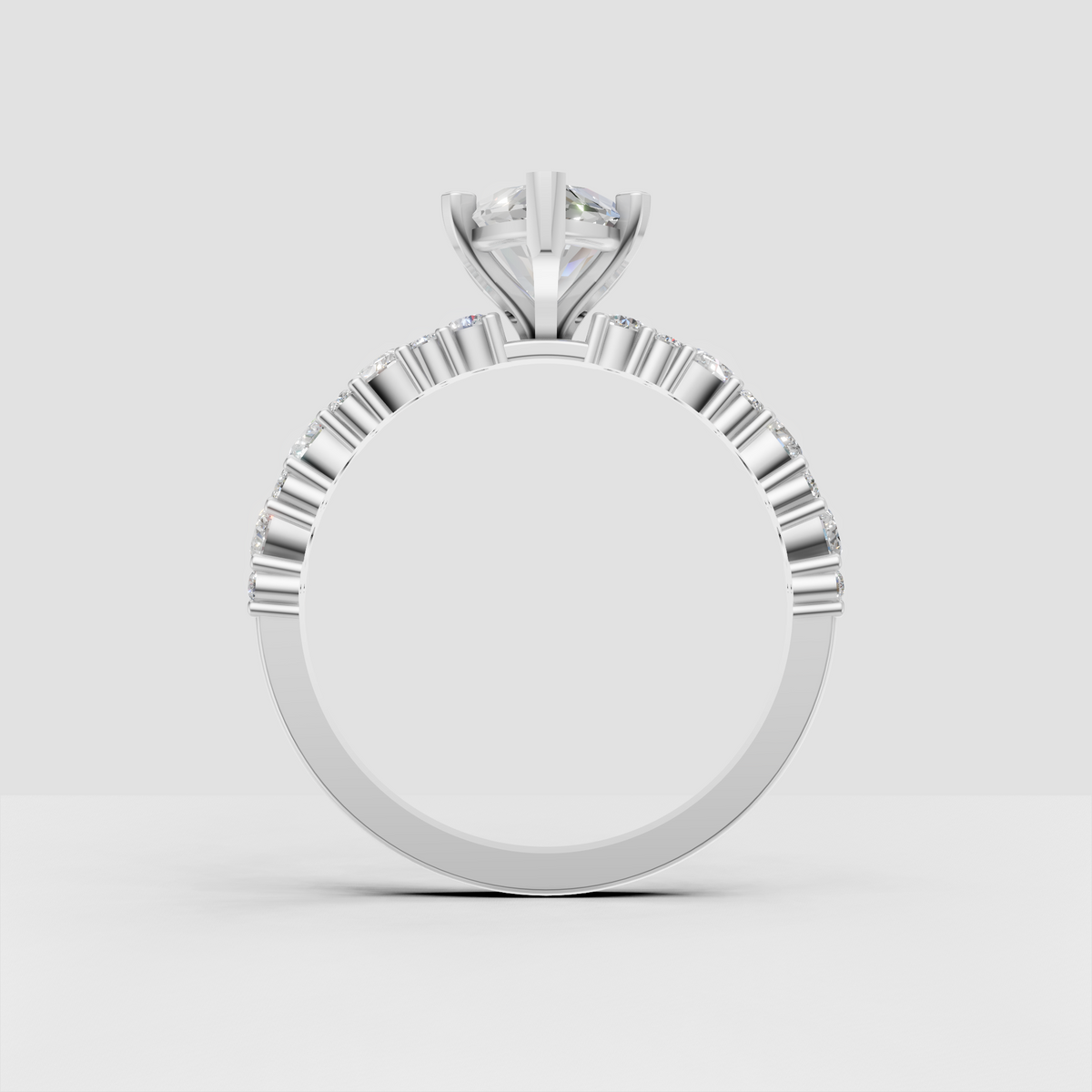 Pear center diamond with sparkling accent stone shoulders