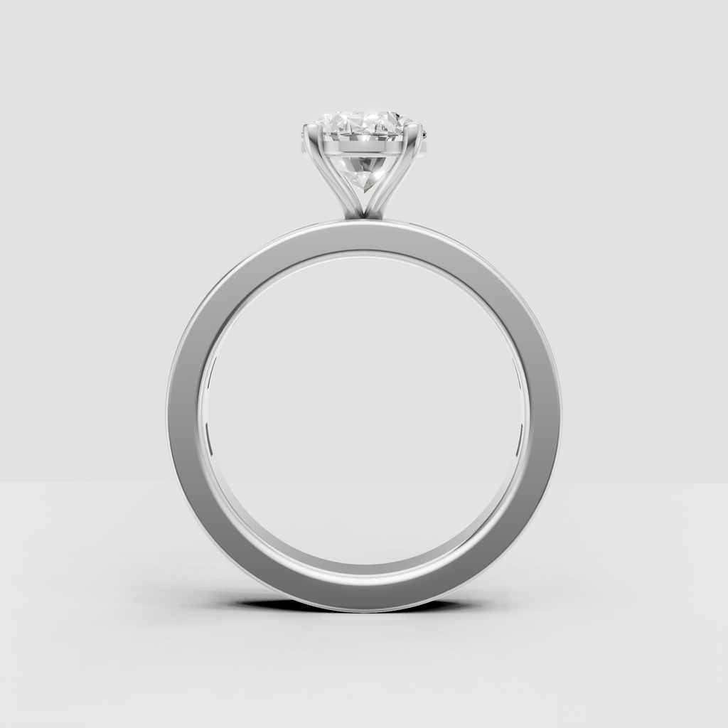 Yellow gold oval engagement ring with linear baguette side stones