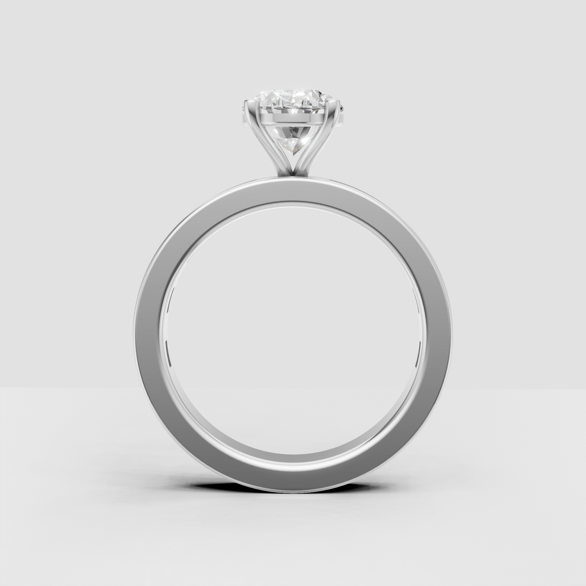Yellow gold oval engagement ring with linear baguette side stones