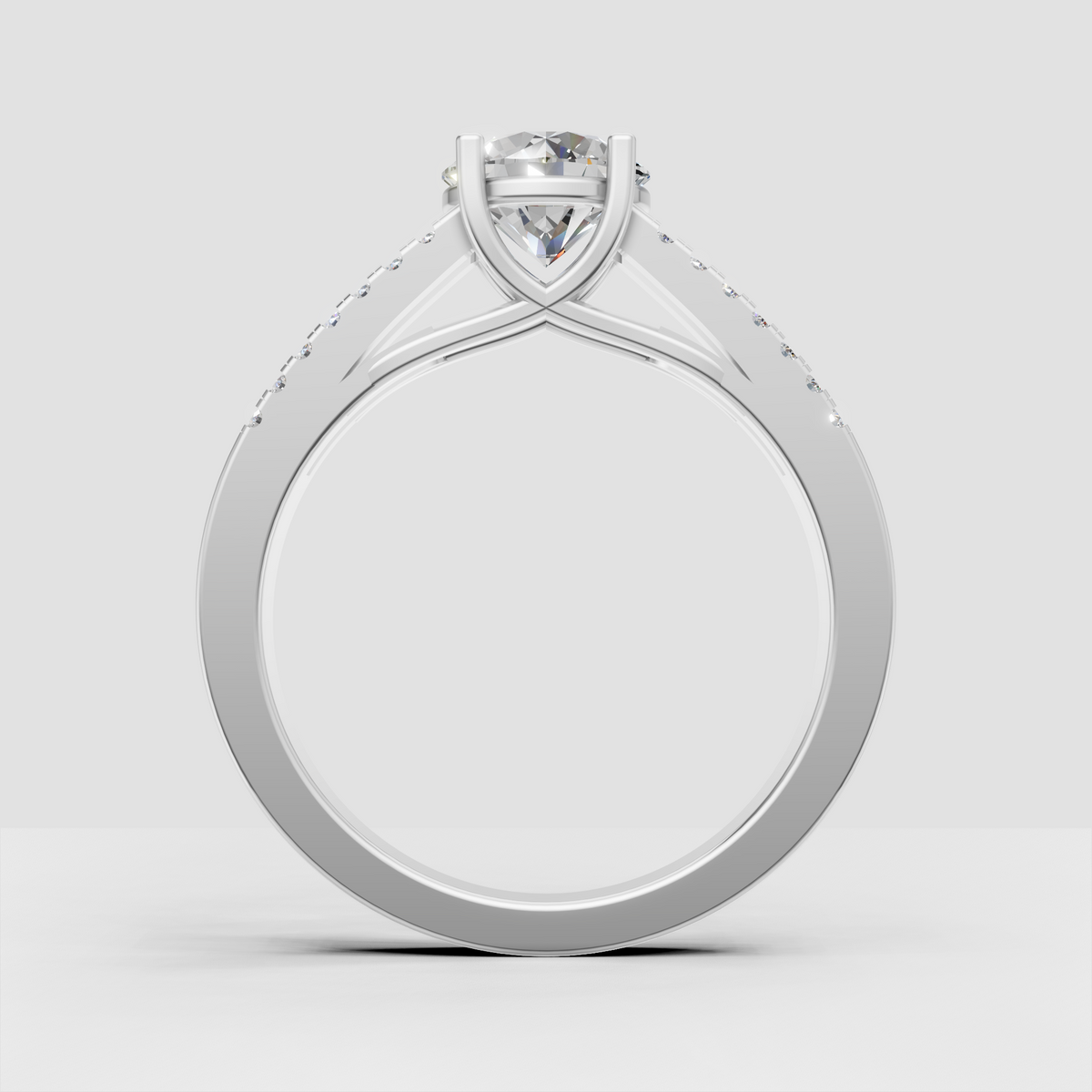 Round Diamond solitaire ring with double rows of pavé-set side stones