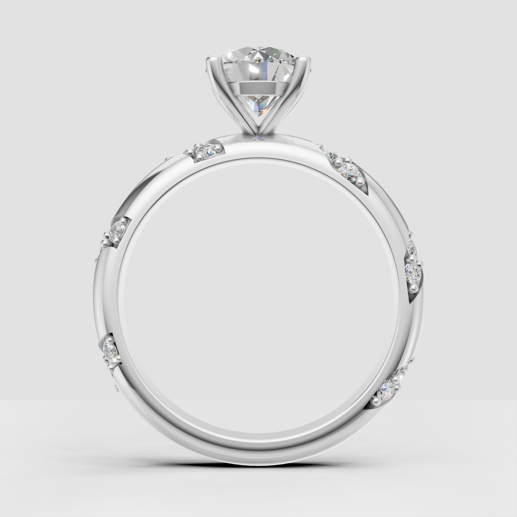 Round diamond solitaire engagement ring with side stones