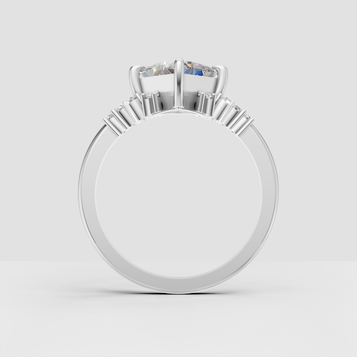 Ornate princess cut engagement ring with sparkling side stones