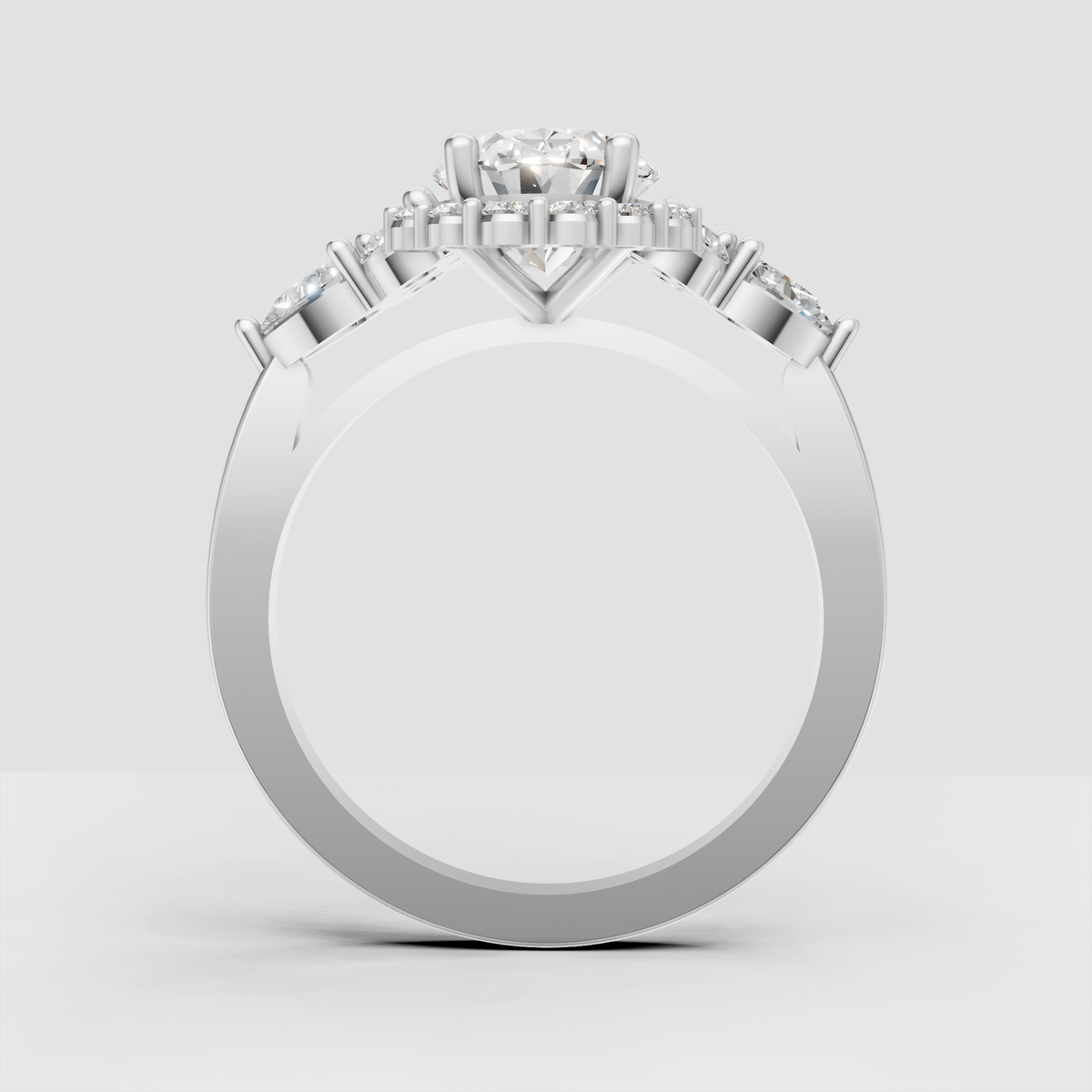 Oval diamond bridal ring with detailed multi-stone halo setting
