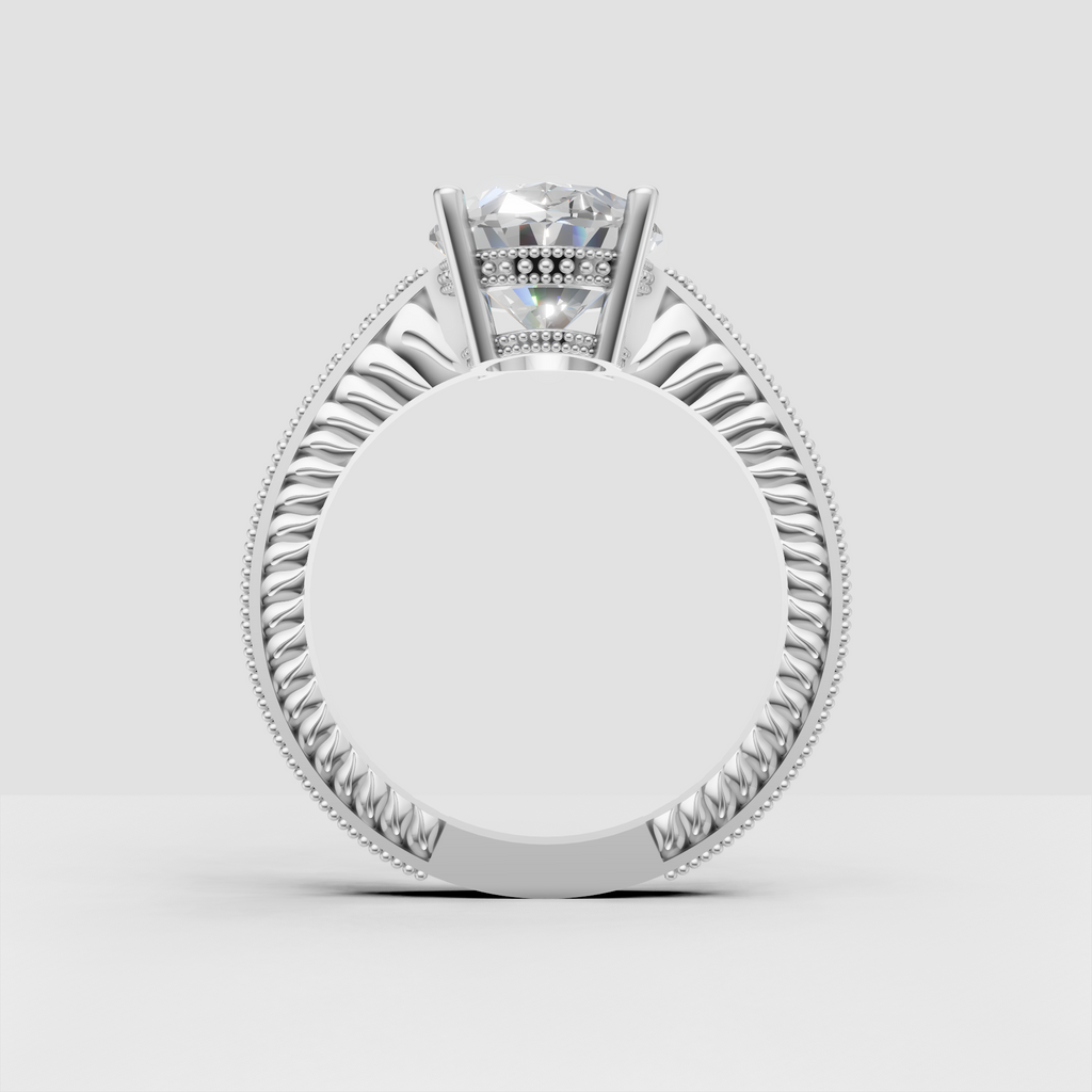Elegant oval diamond engagement ring with engraved vintage detailing