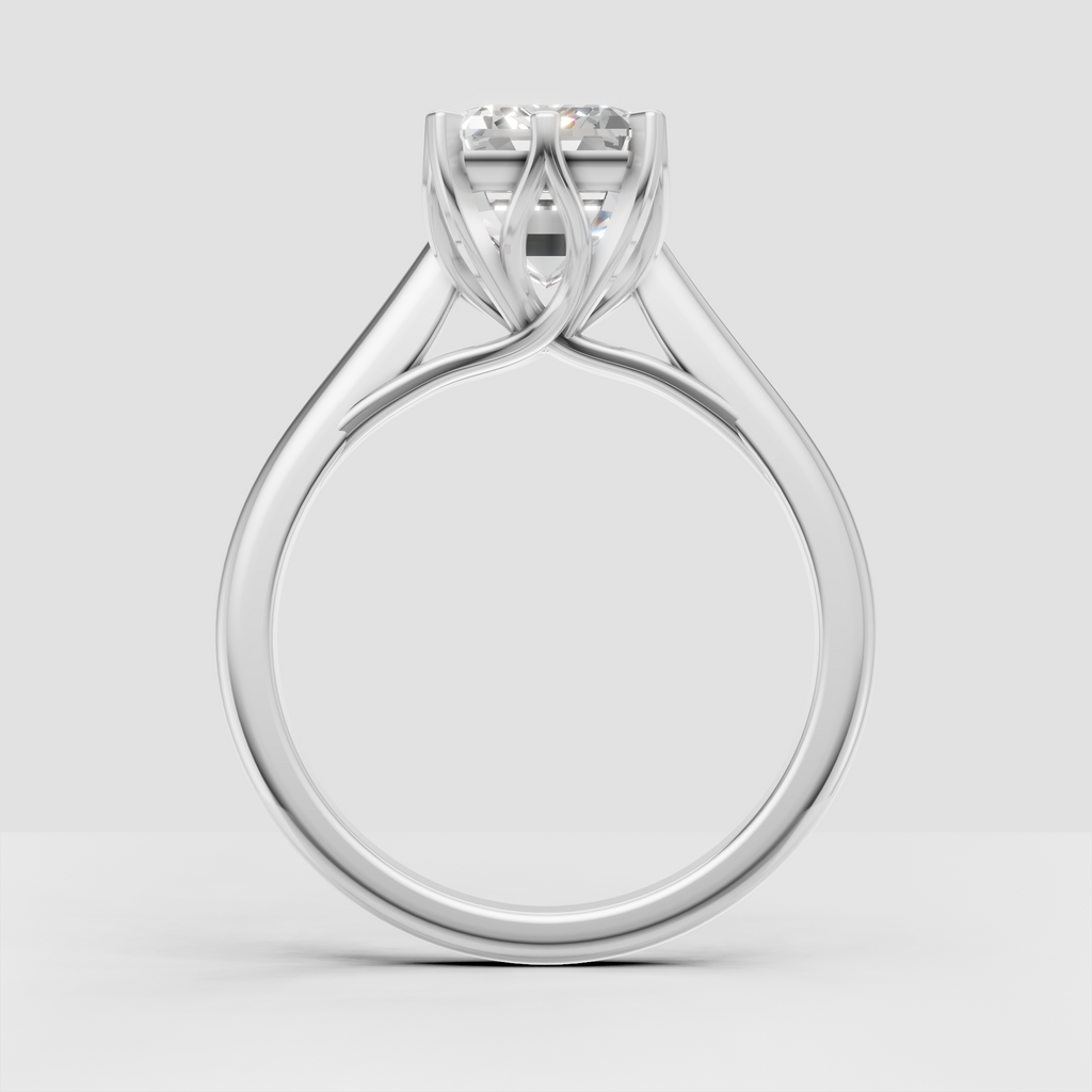 Yellow gold rectangular emerald cut engagement ring