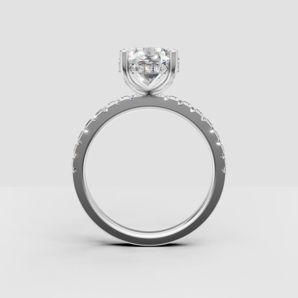 Oval diamond hidden halo ring with diamond accented shoulders