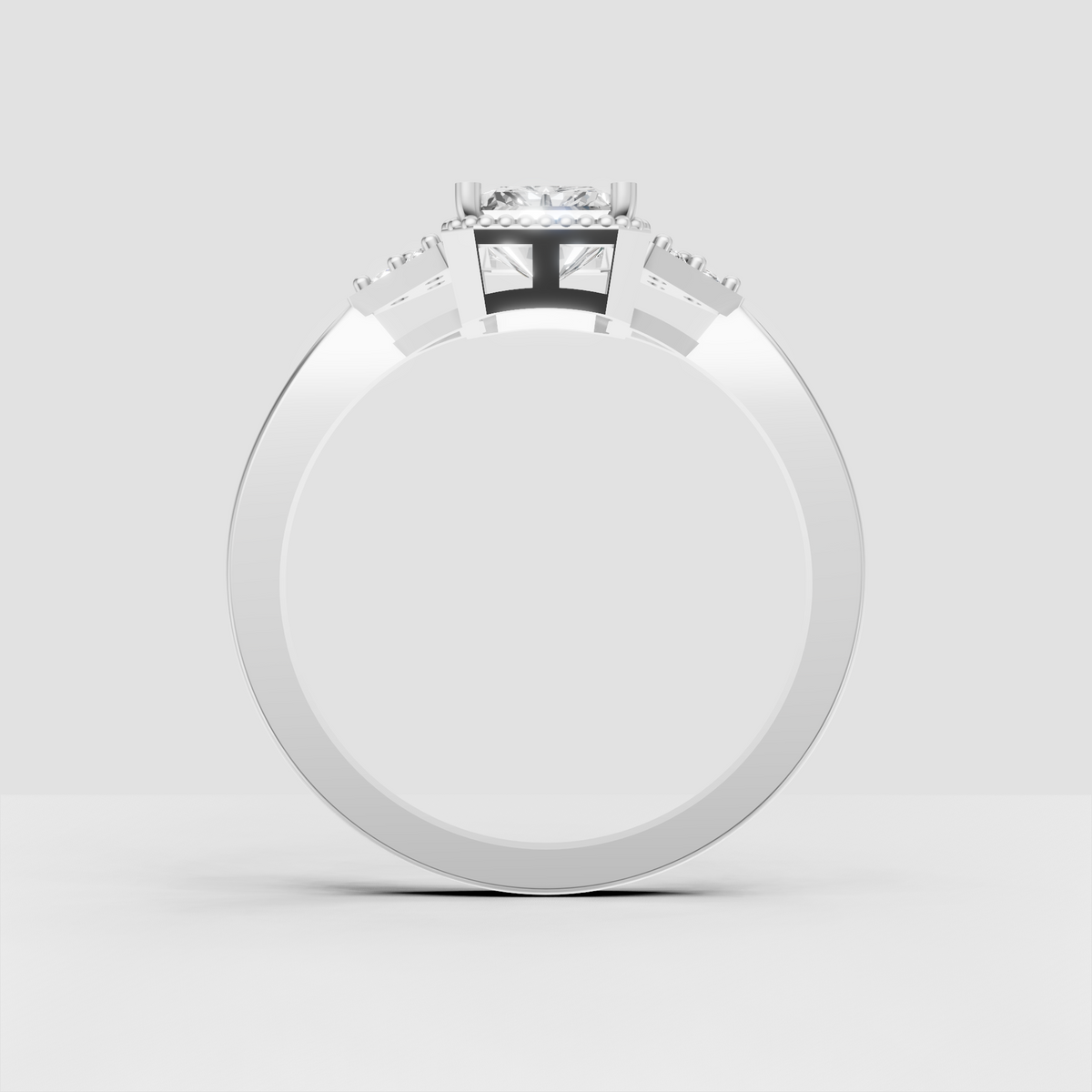 Yellow gold halo engagement ring featuring an elongated Radiant center stone