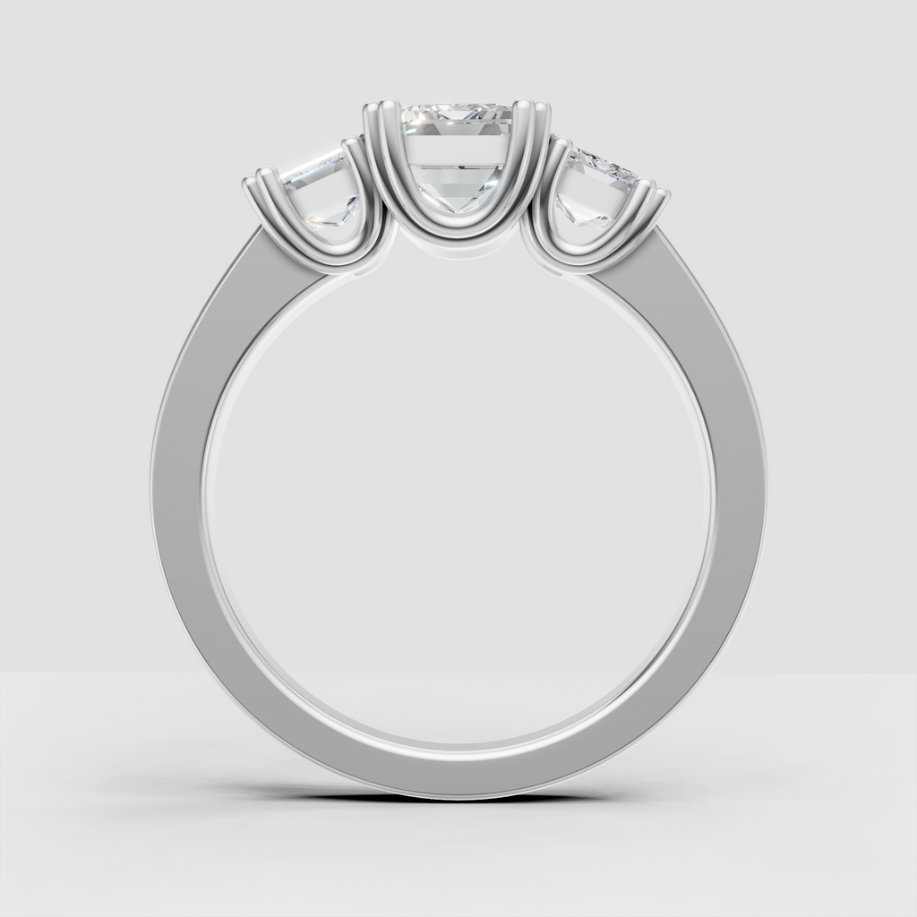 Emerald cut Diamond bridal ring with sculpted prongs
