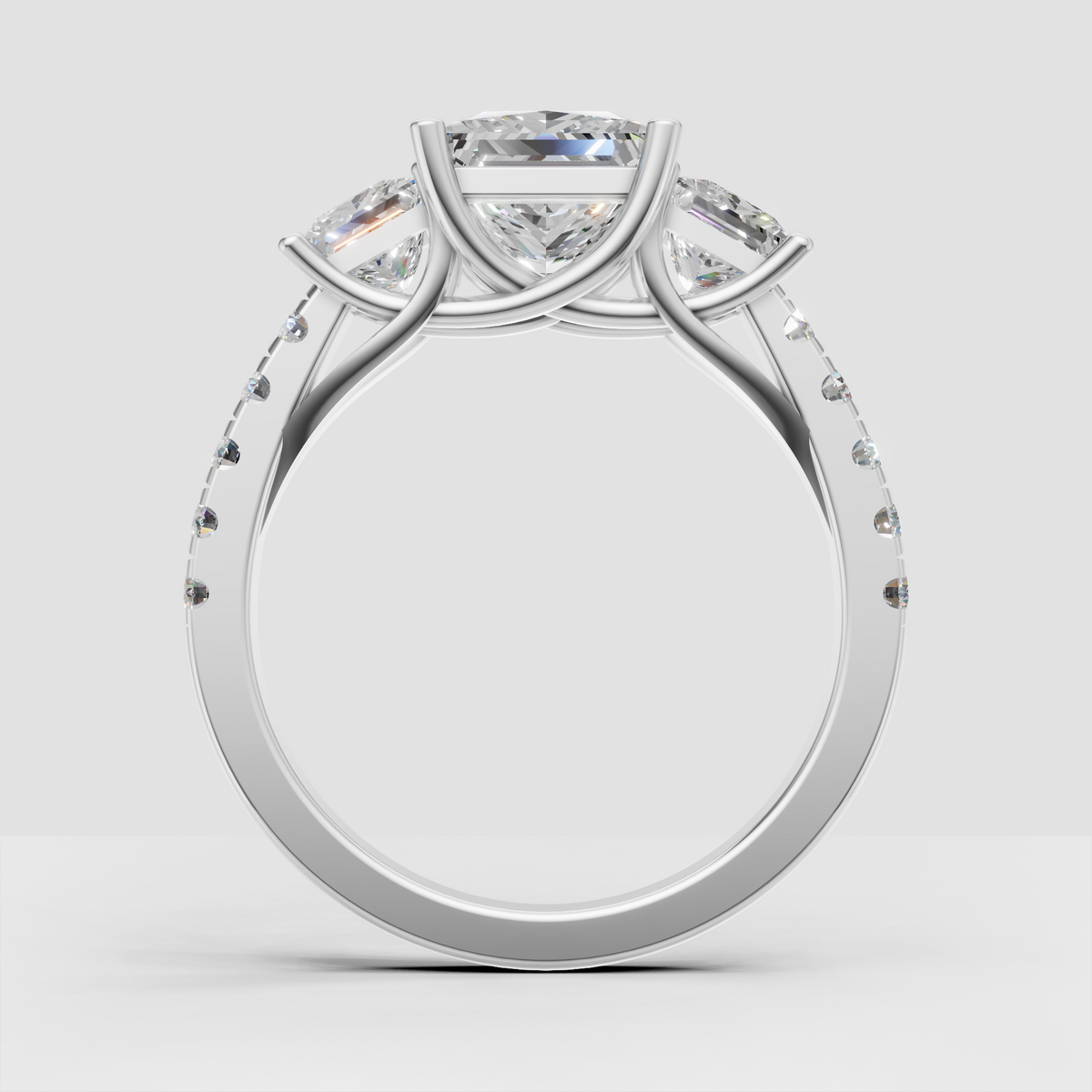 Elegant three stone princess diamond engagement ring