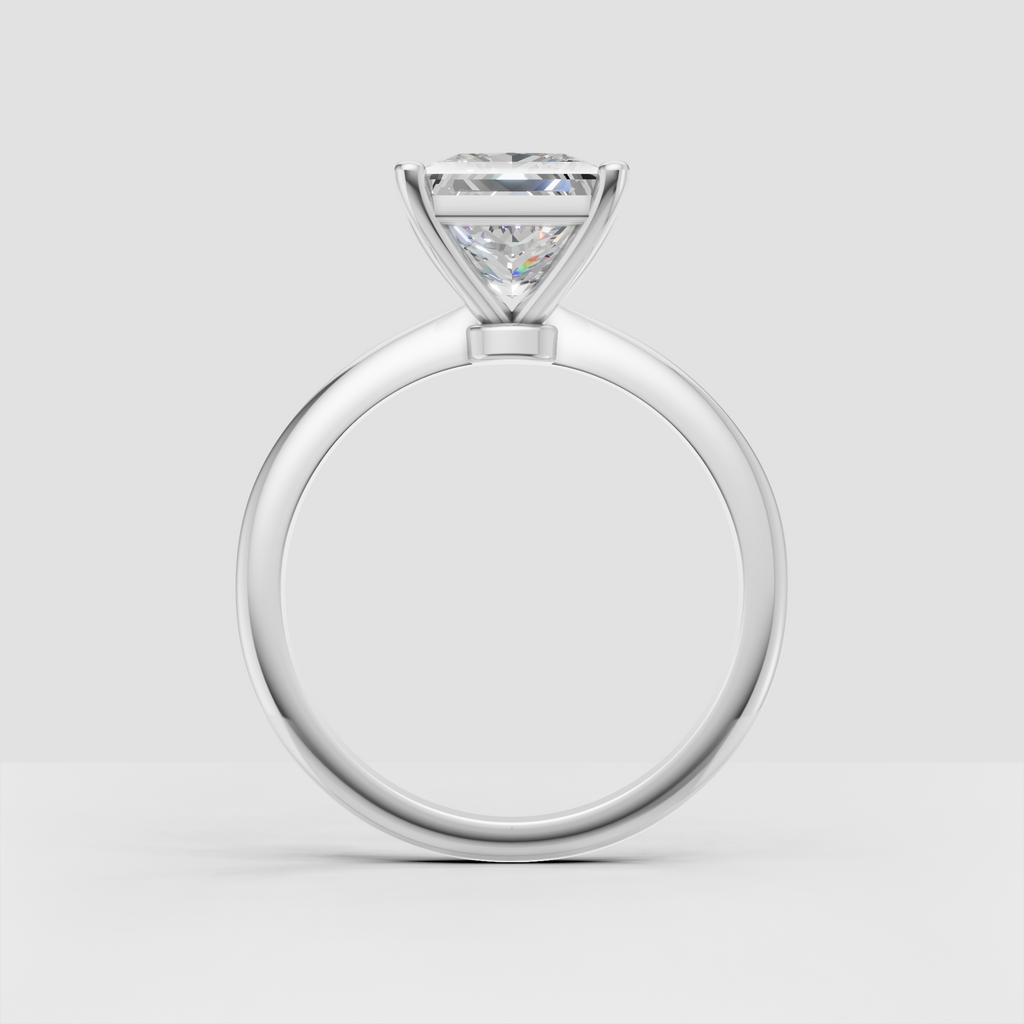 Elegant square cut diamond solitaire ring with refined four prong setting