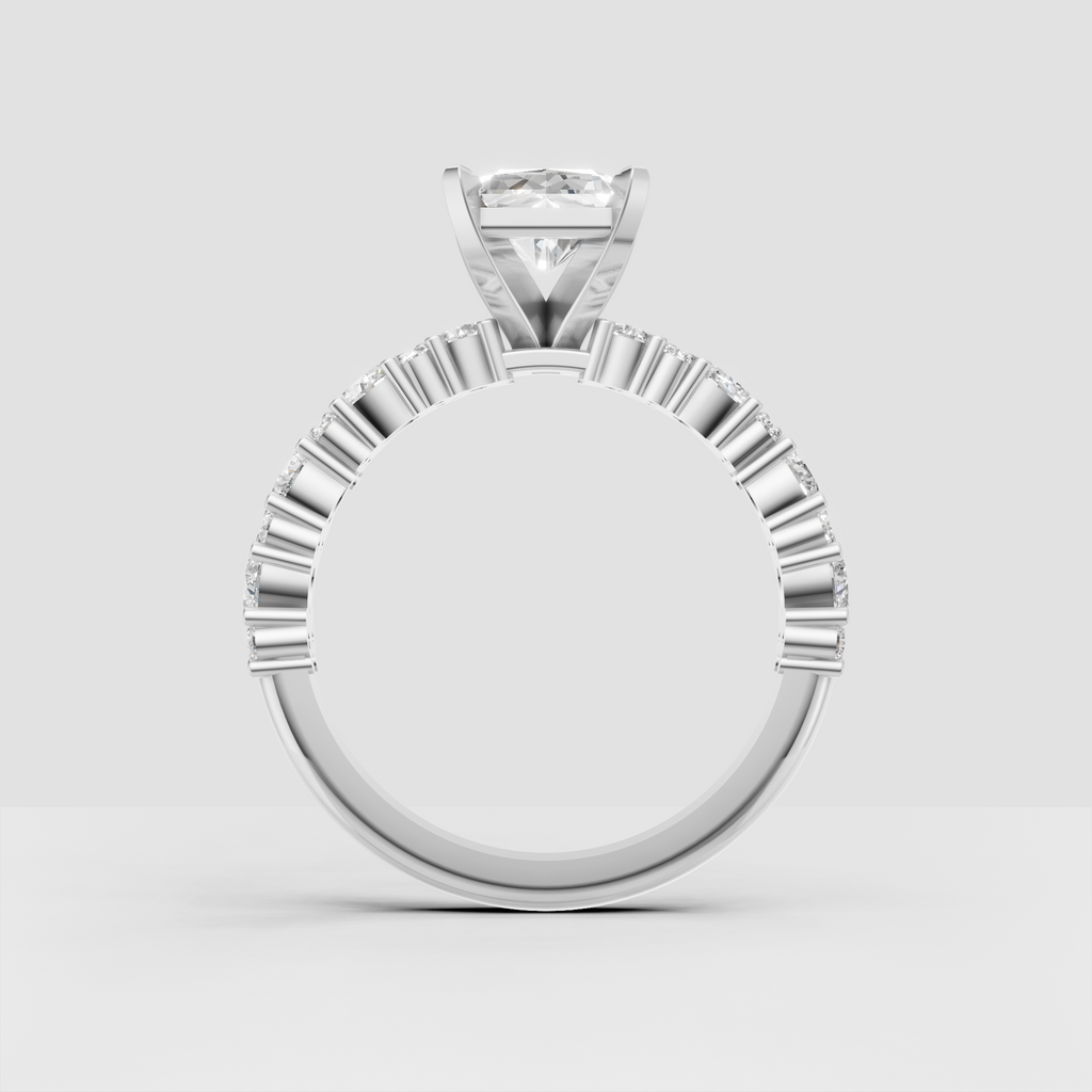 Radiant cut solitaire ring with sparkling round accent diamonds in gold