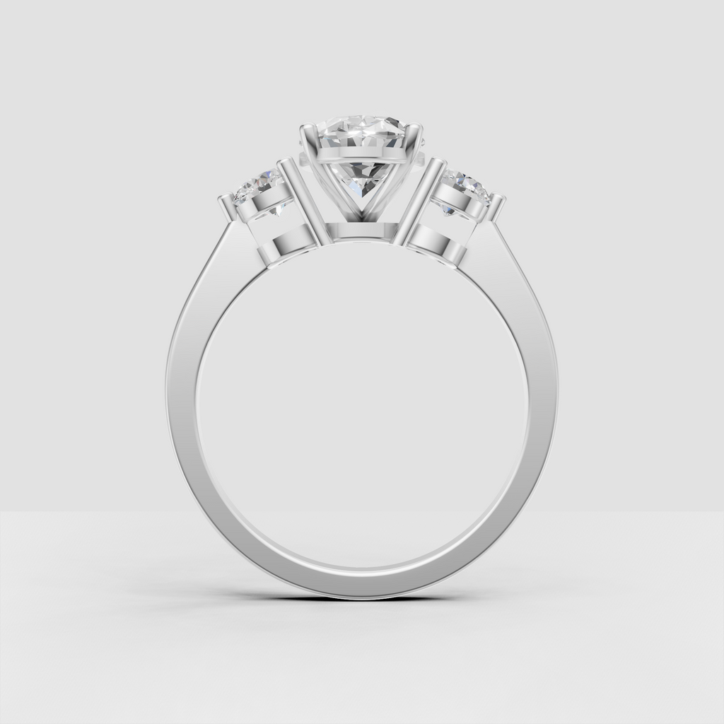 Oval shaped diamond ring with coordinating side stones