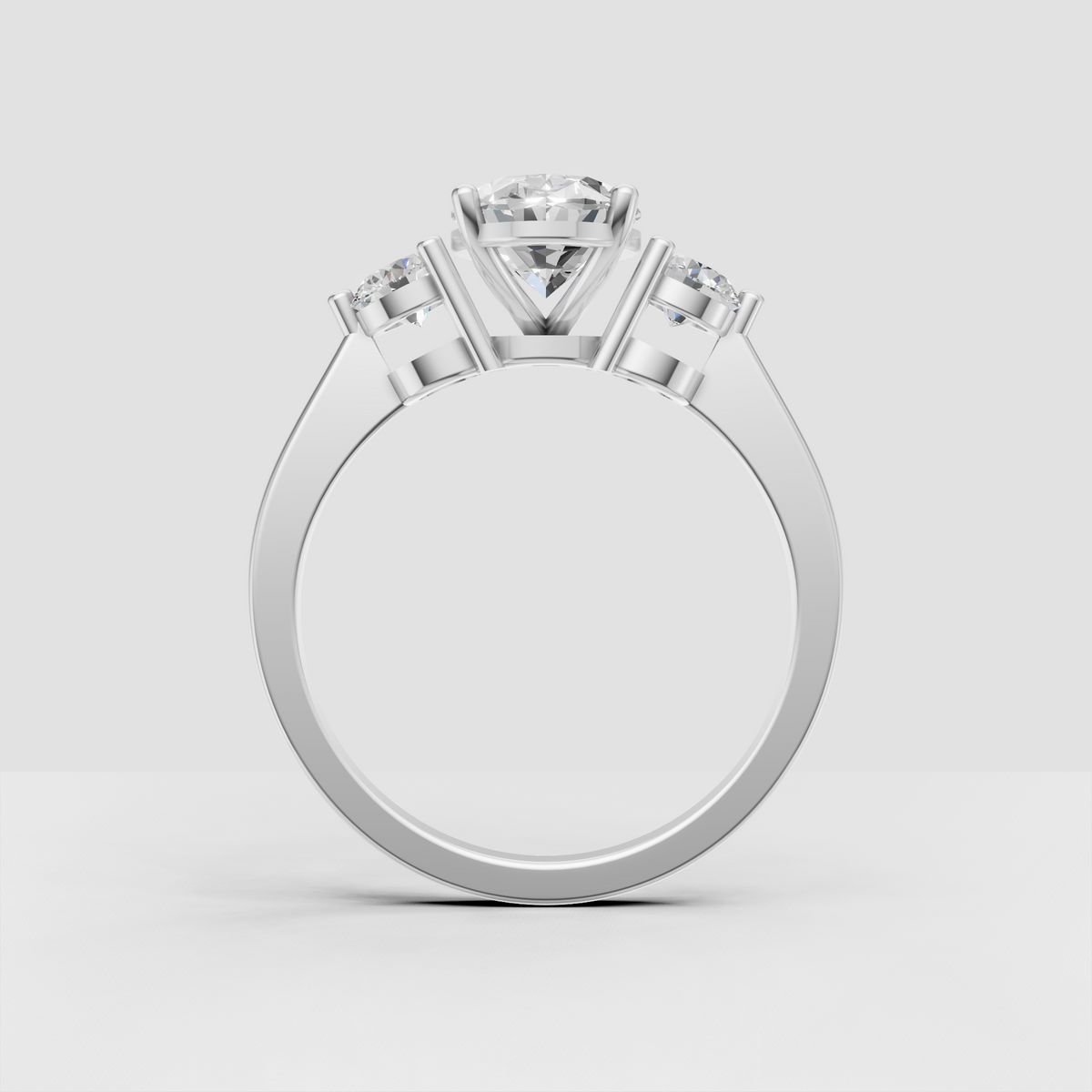 Oval shaped diamond ring with coordinating side stones