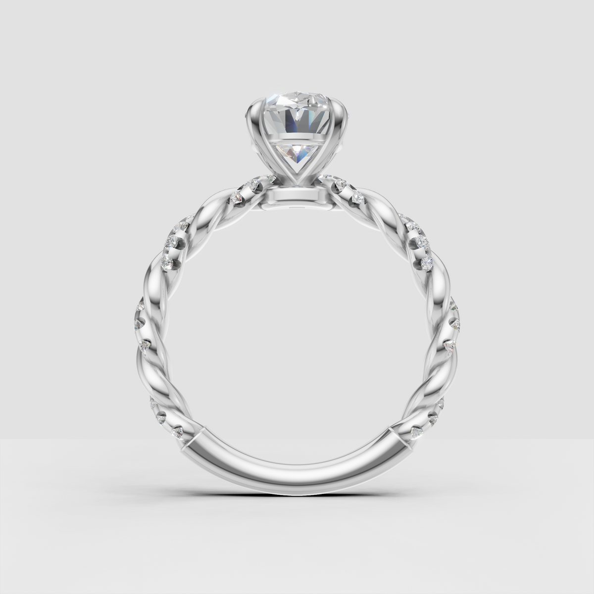 Oval center stone engagement ring with sparkling pavé side diamonds