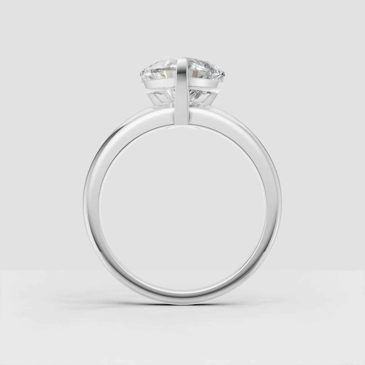 Classic heart cut diamond engagement ring with smooth gold shank
