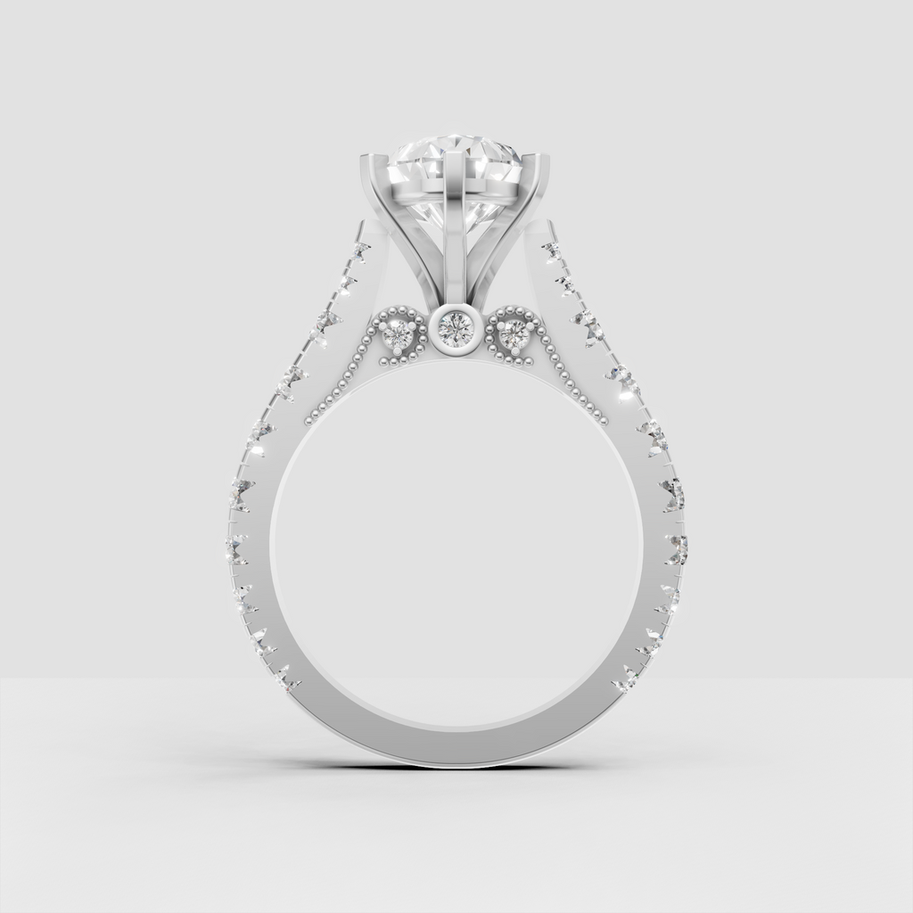 Elegant pear cut engagement ring with milgrain bead detailing