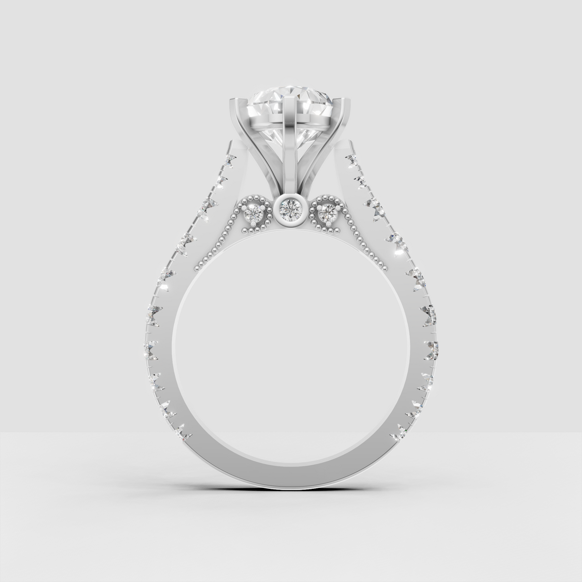 Elegant pear cut engagement ring with milgrain bead detailing